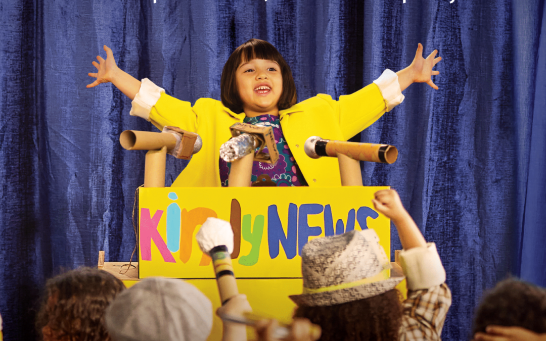 A child raising bother her hands on a free kindy poster